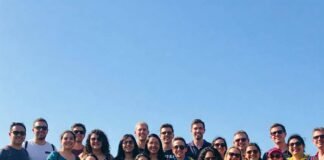 How to Overcome the Fear of Coming Out: A Step-by-Step Approach Diverse Community Celebrates with Rainbow Flag