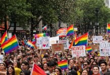 How to Get Involved in LGBTQ+ Activism: A Beginner’s Guide Pride Parade Crowd: Love & Equality
