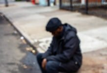 The Role of Art in LGBTQ+ History: A Reflection of Struggle and Triumph Shaky close-up of crumpled protest flyer in drawer