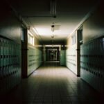 How Schools Are Improving LGBTQ+ Inclusivity: Must-Know Programs for 2025 Dim, off-center high school hallway snapshot, 2025 visit