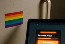 How to Support LGBTQ+ Activism Without Being at the Front Lines Crooked rainbow magnet and glowing donation tab